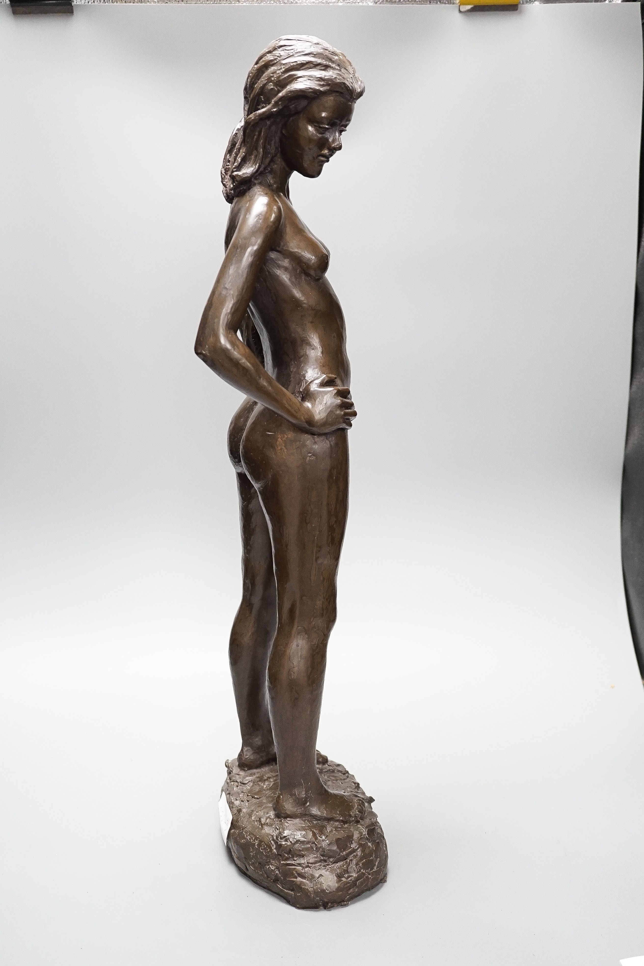 A large bronzed resin figure “Fiona standing” signed Kerek ‘83 64cm